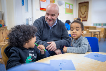 Chief Nursing Officer for England Duncan Burton meets children taking part in the Tiny Teeth toothbrushing initiative at Life Bank Nursery in Liverpool