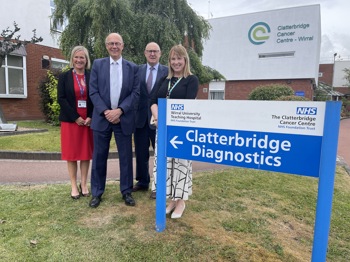 Four people stood outside Clatterbridge Cancer Centre